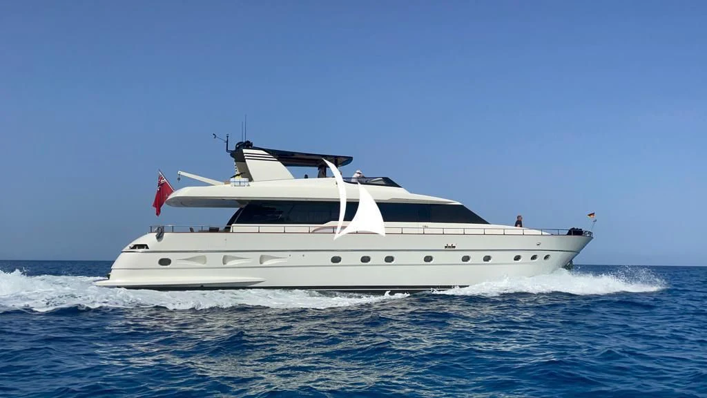a white boat on the water aboard WHITEHAVEN Yacht for Sale