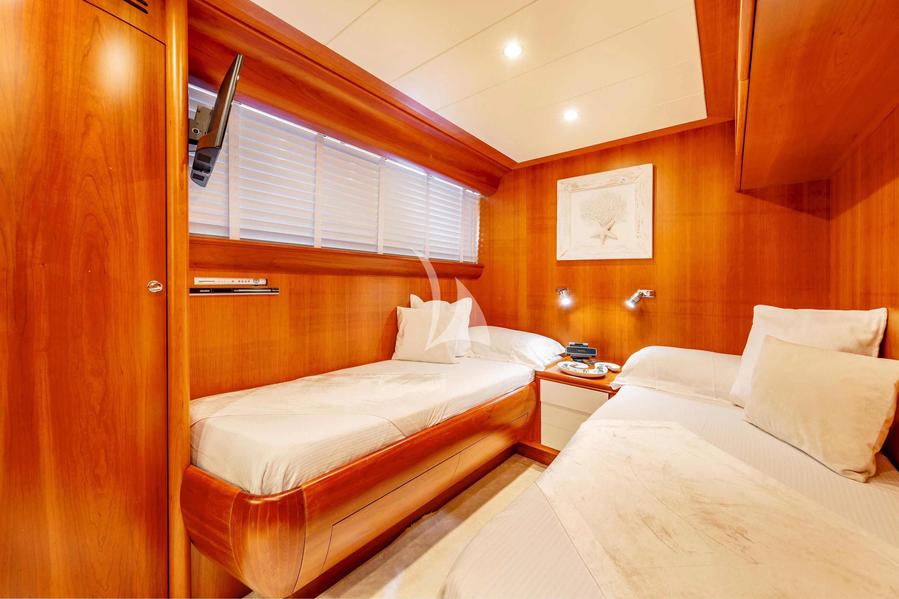 a couple of beds in a room aboard WHITEHAVEN Yacht for Sale