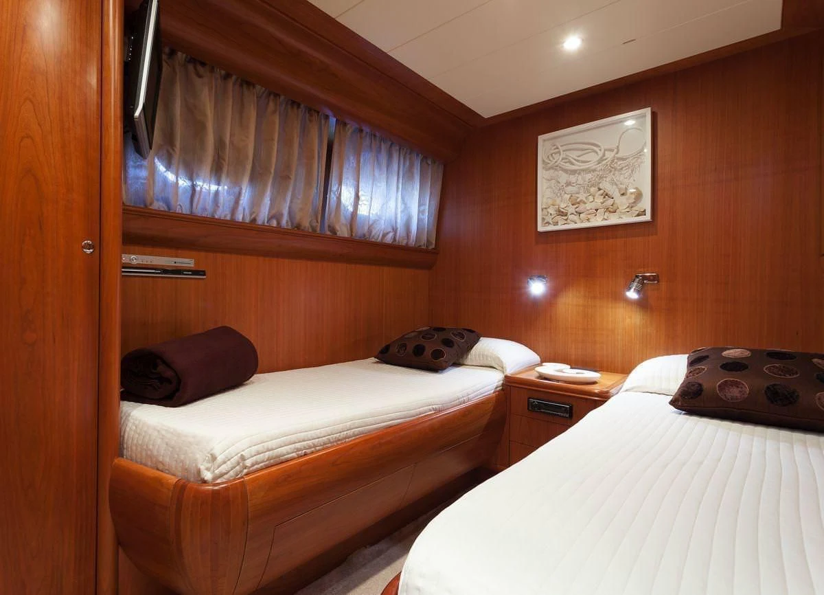 a couple of beds in a room aboard WHITEHAVEN Yacht for Sale
