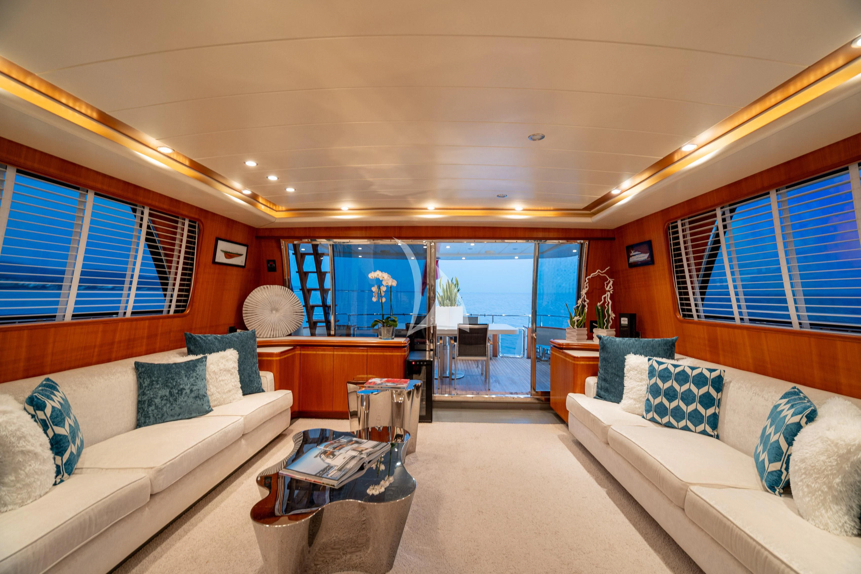 a living room with a large window aboard WHITEHAVEN Yacht for Sale