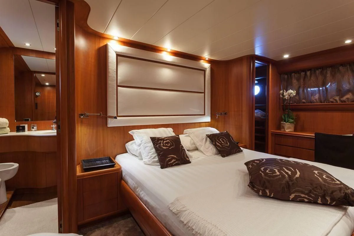 a bed in a room aboard WHITEHAVEN Yacht for Sale