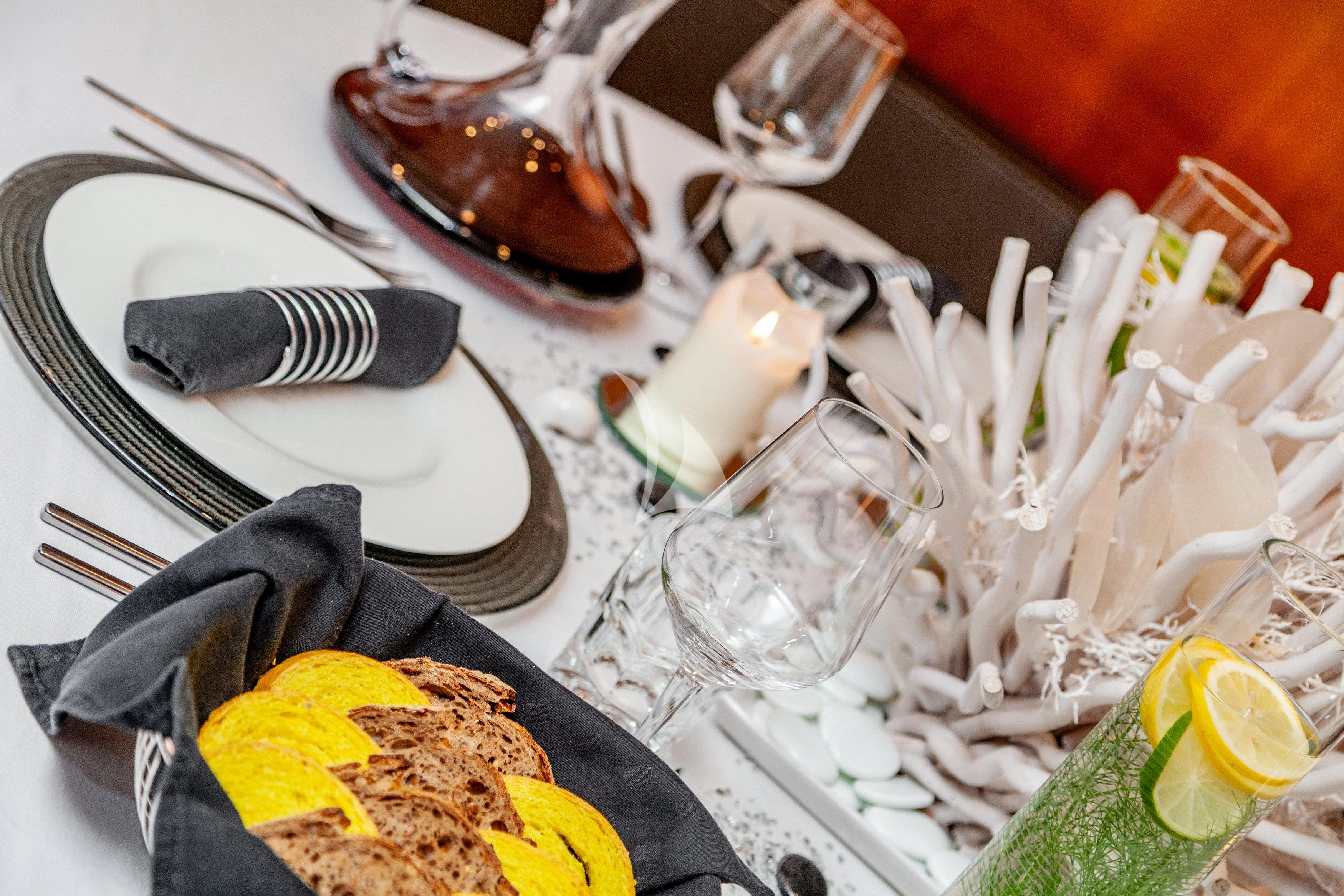 a table with food on it aboard WHITEHAVEN Yacht for Sale