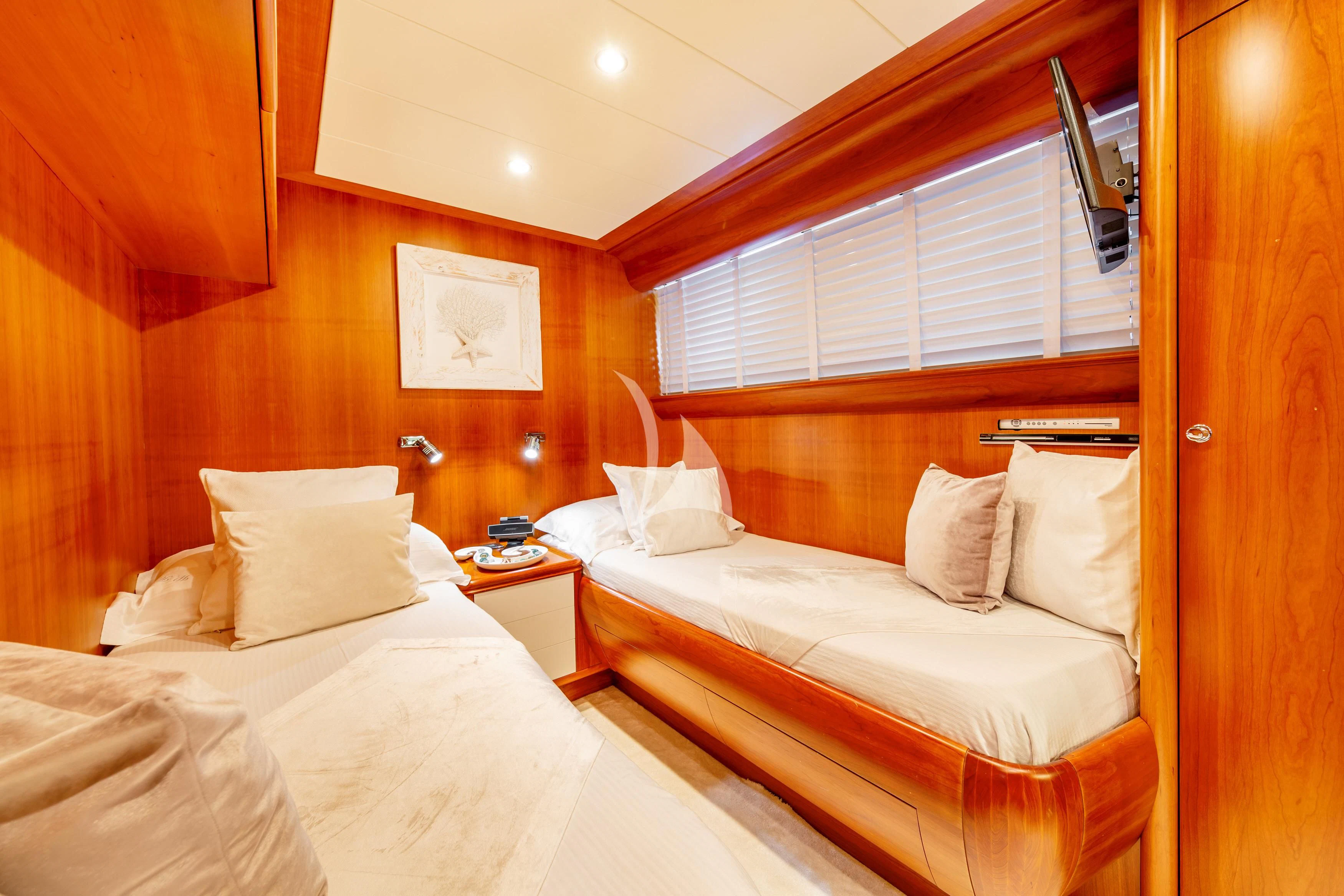 a room with two beds aboard WHITEHAVEN Yacht for Sale