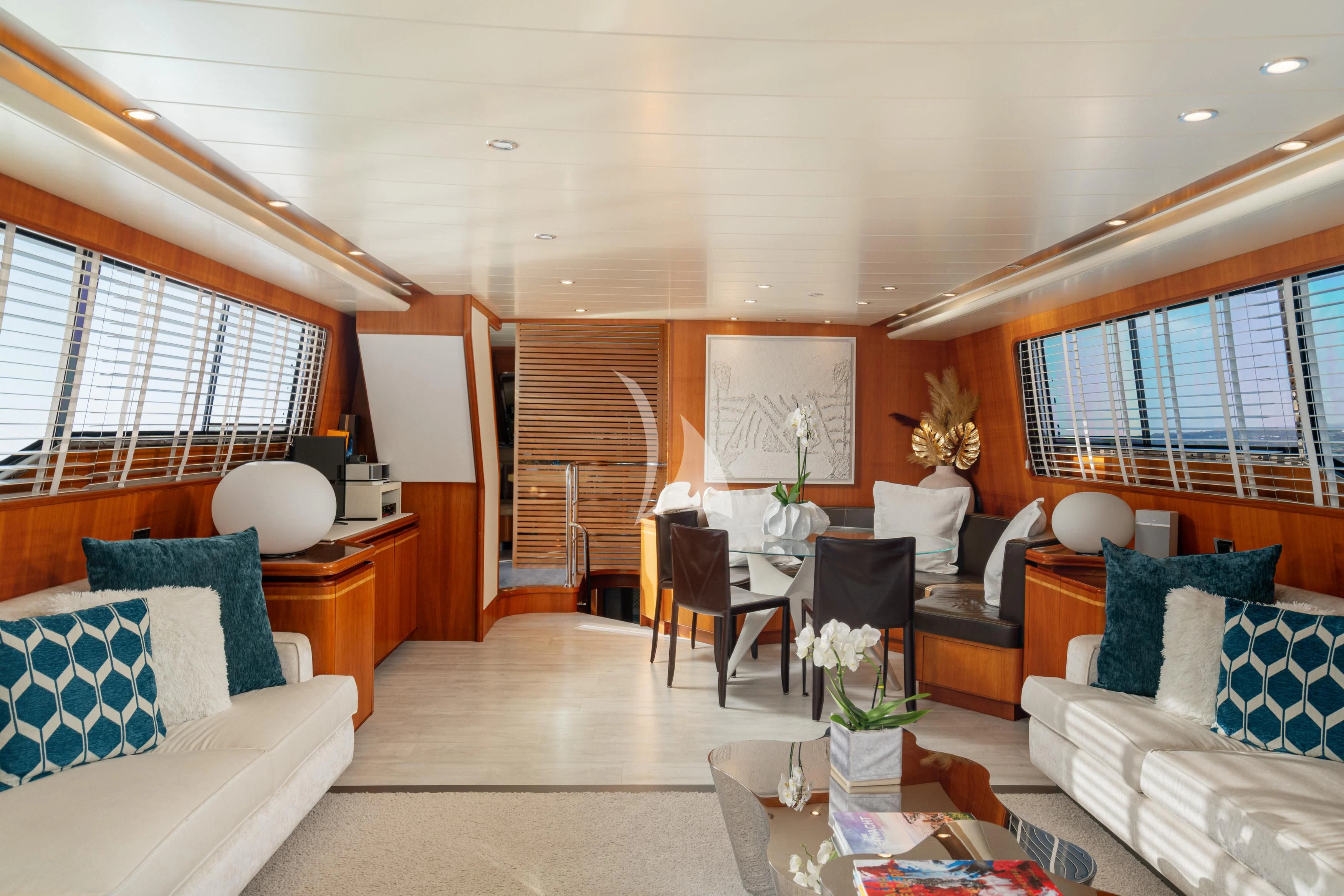 a living room with a wood floor aboard WHITEHAVEN Yacht for Sale