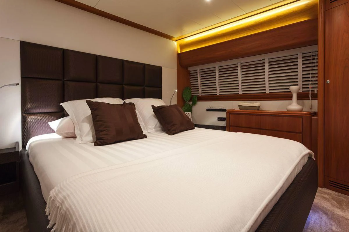 a bed with pillows aboard WHITEHAVEN Yacht for Sale