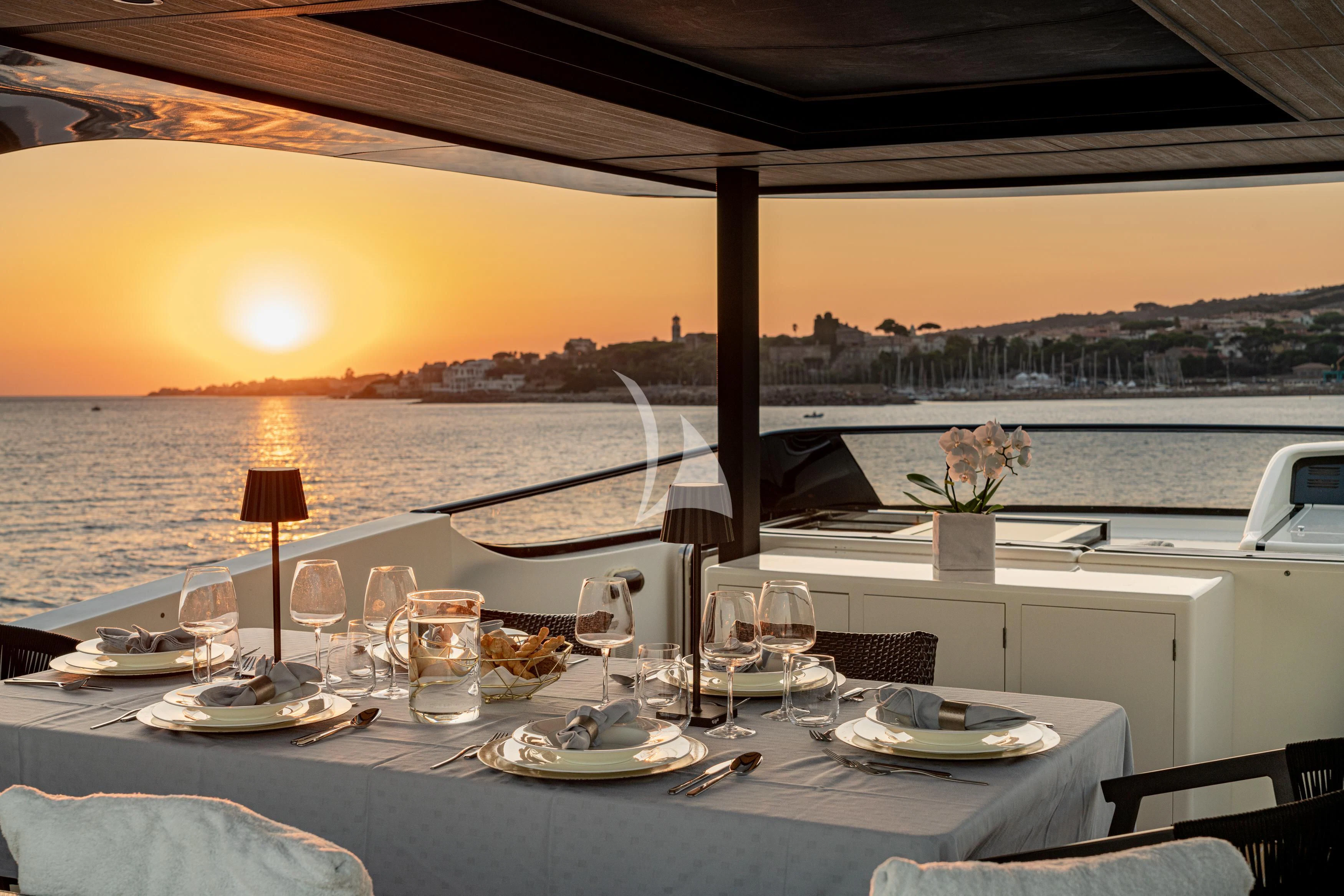 a table set for a dinner aboard WHITEHAVEN Yacht for Sale