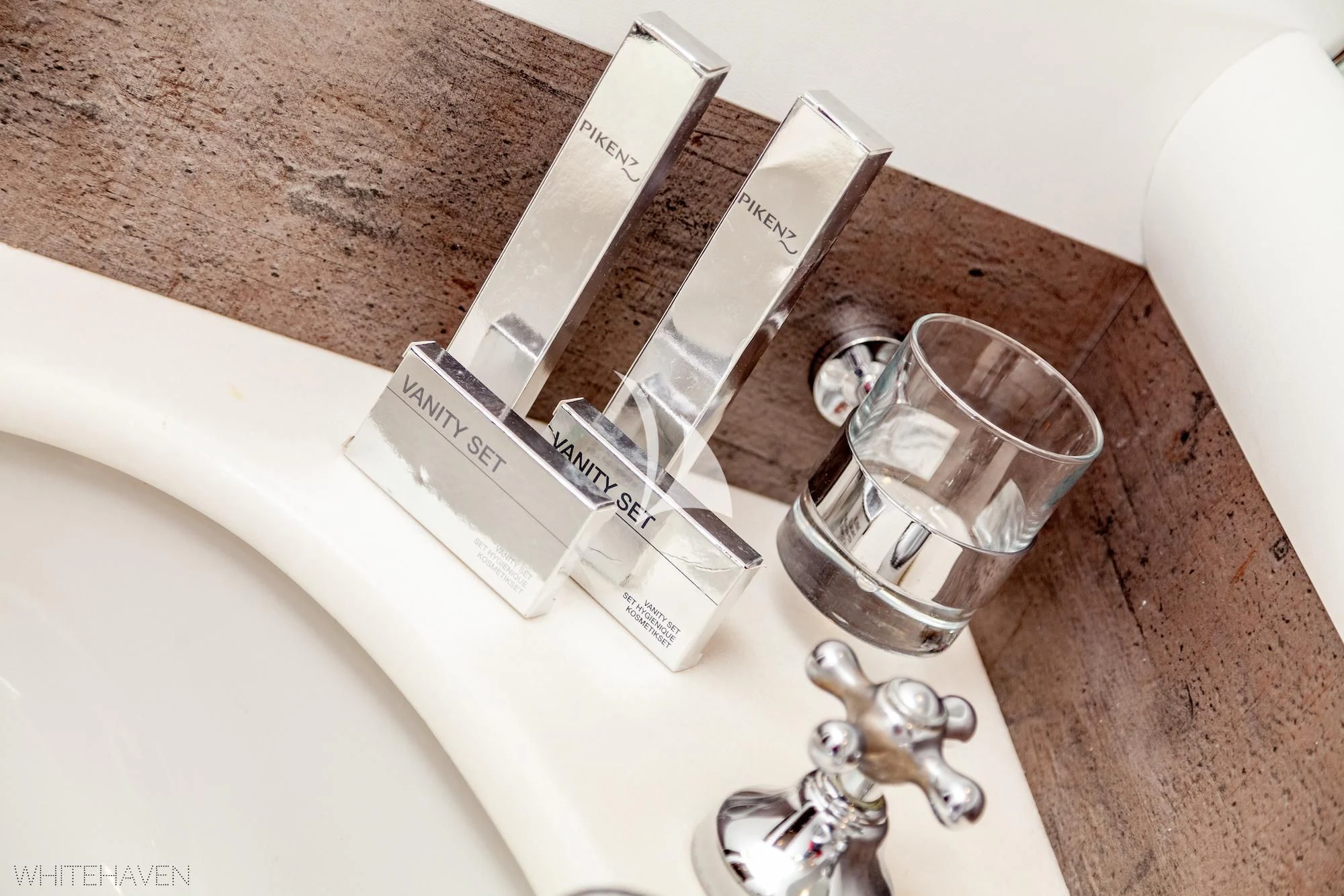 a group of glasses on a counter aboard WHITEHAVEN Yacht for Sale