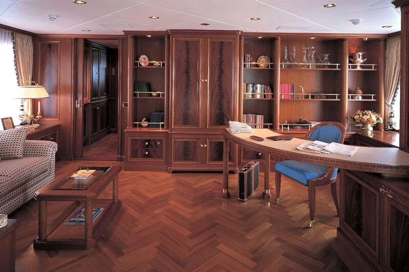 a room with a desk and a chair aboard CORINTHIAN Yacht for Sale
