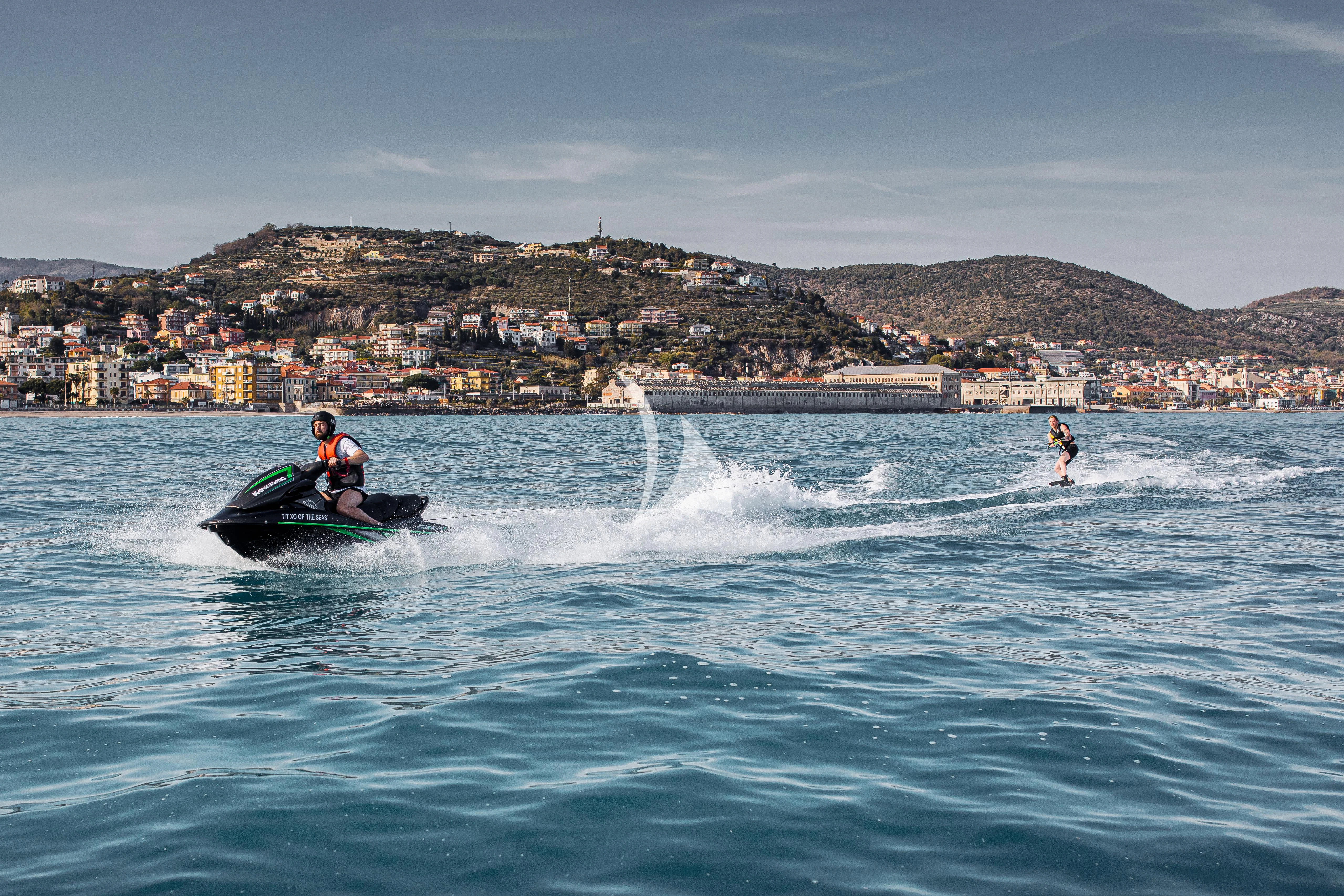 people water skiing on the water aboard XO OF THE SEAS Yacht for Sale