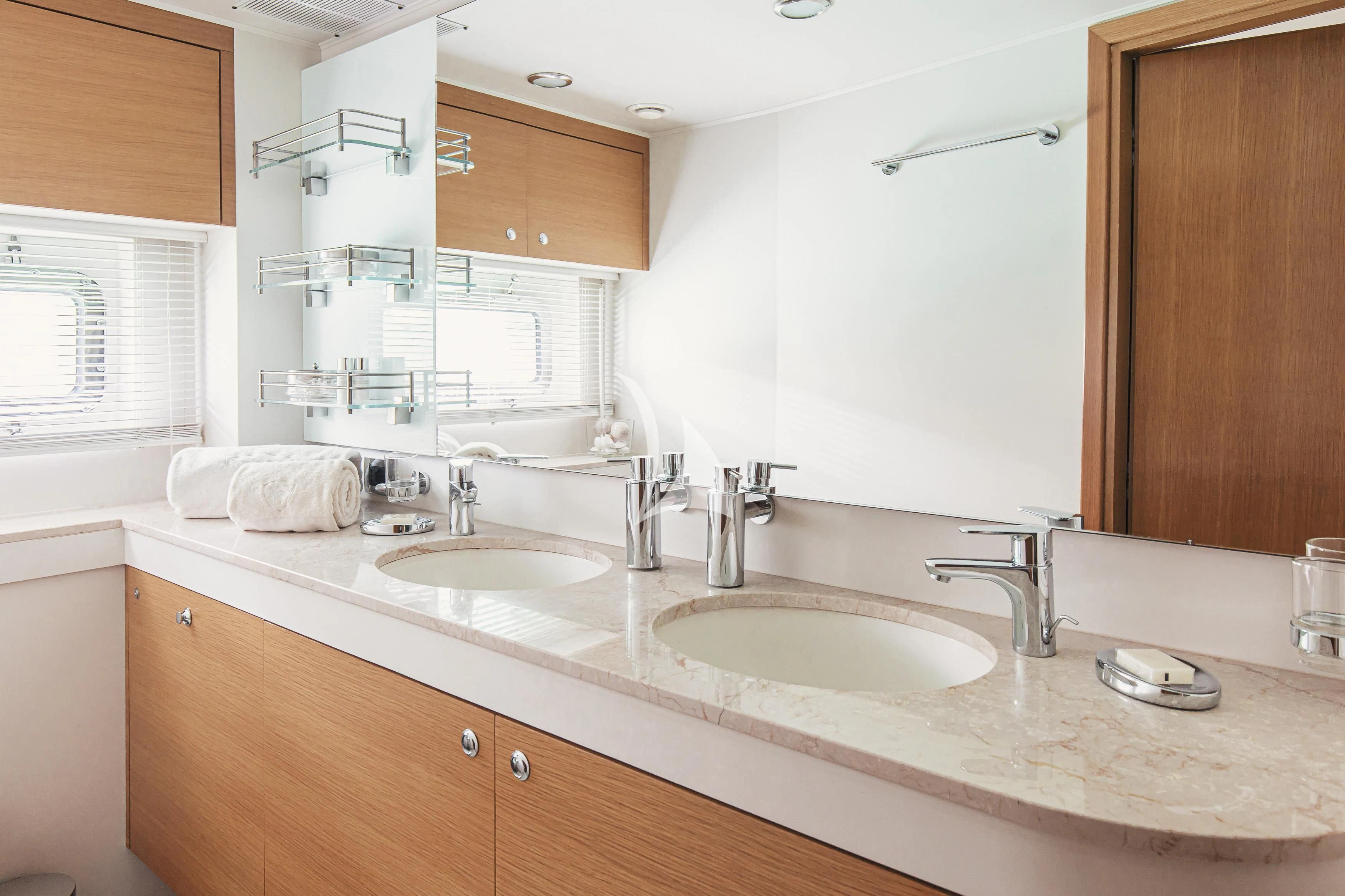 a bathroom with two sinks aboard XO OF THE SEAS Yacht for Sale