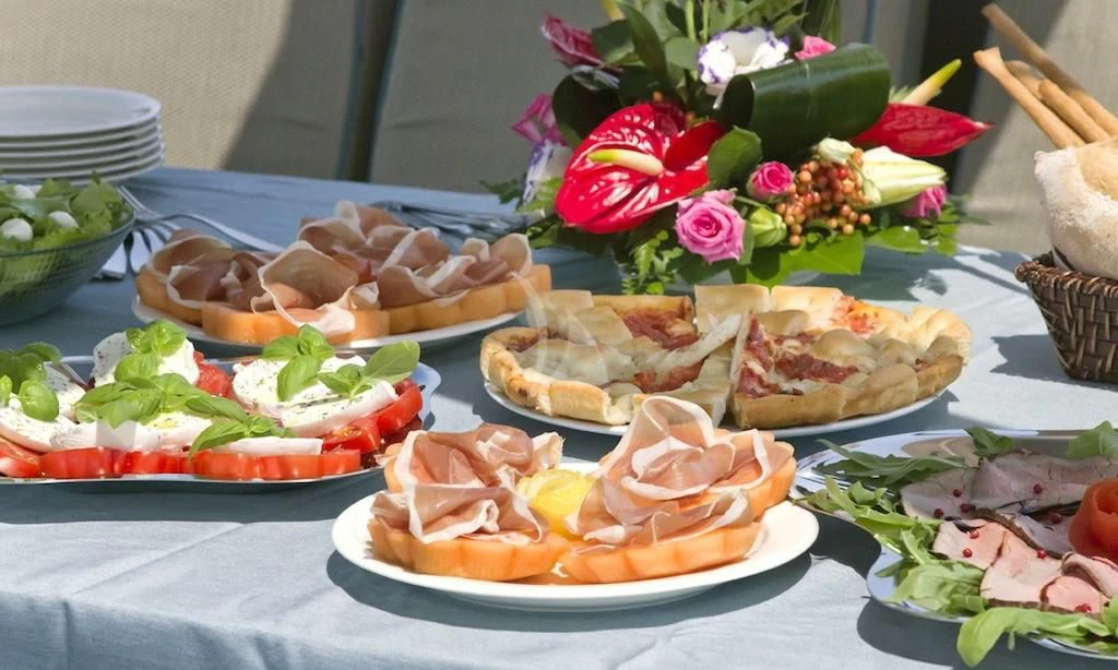 a table full of food aboard XO OF THE SEAS Yacht for Sale