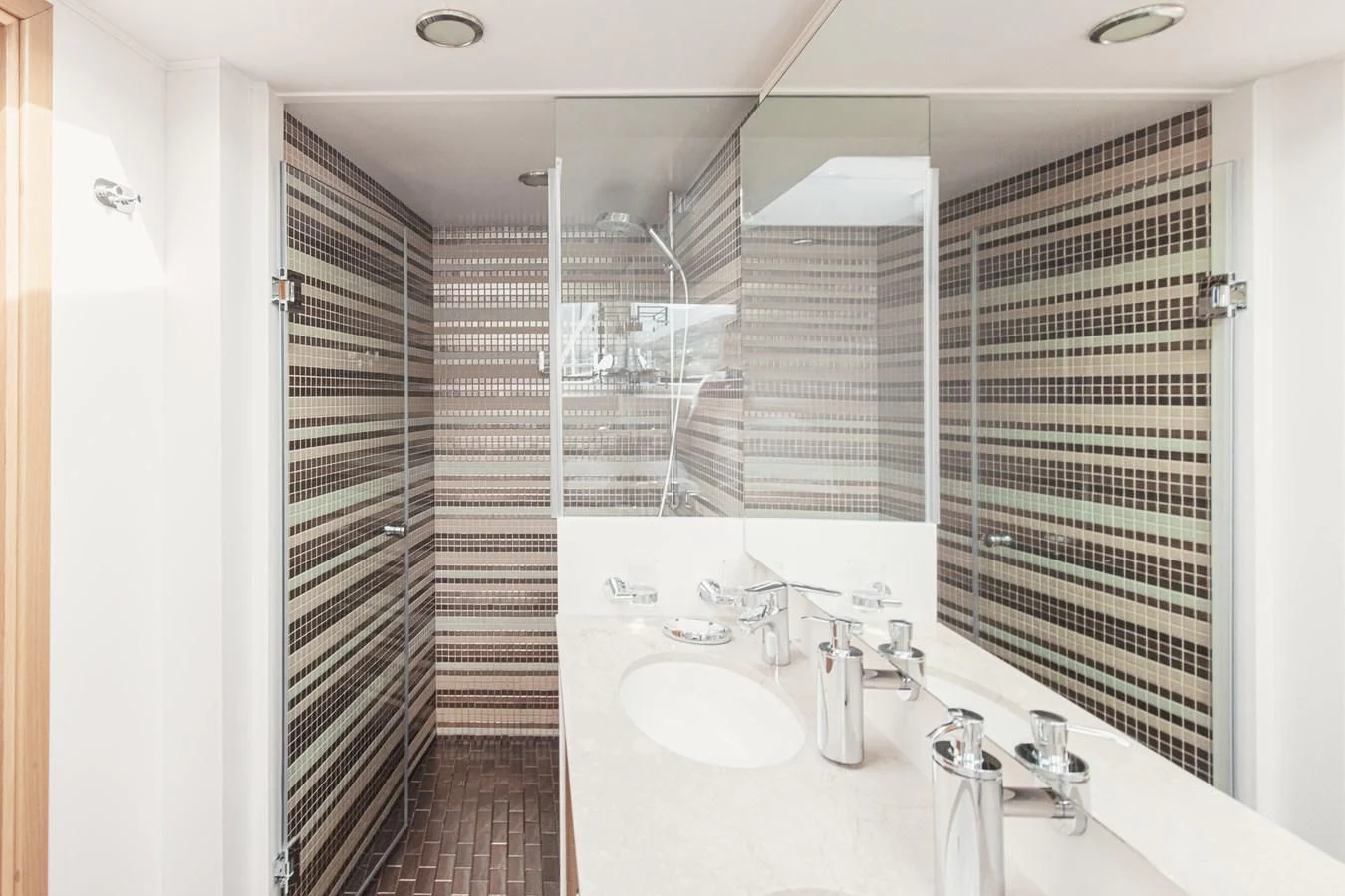 a bathroom with a sink and a shower aboard XO OF THE SEAS Yacht for Sale