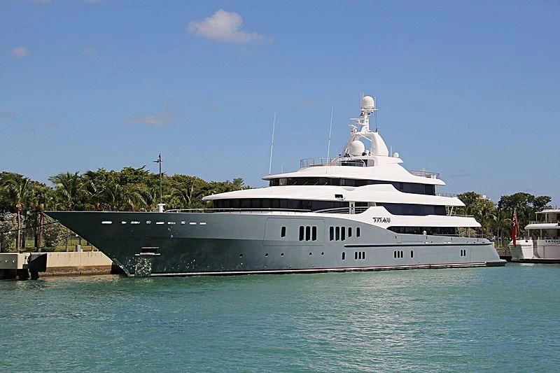 a large cruise ship docked aboard TITAN Yacht for Sale