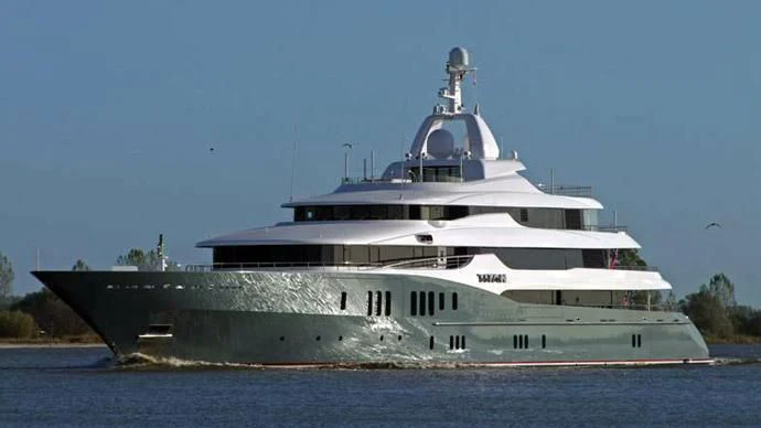 a large ship on the water aboard TITAN Yacht for Sale