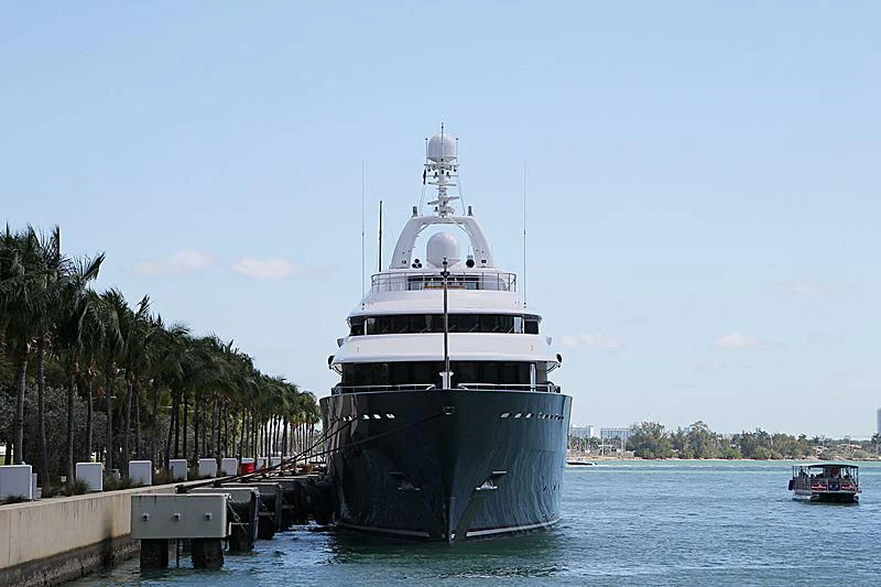 a large boat in the water aboard TITAN Yacht for Sale