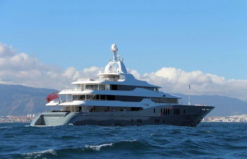 a large white boat in the water aboard TITAN Yacht for Sale