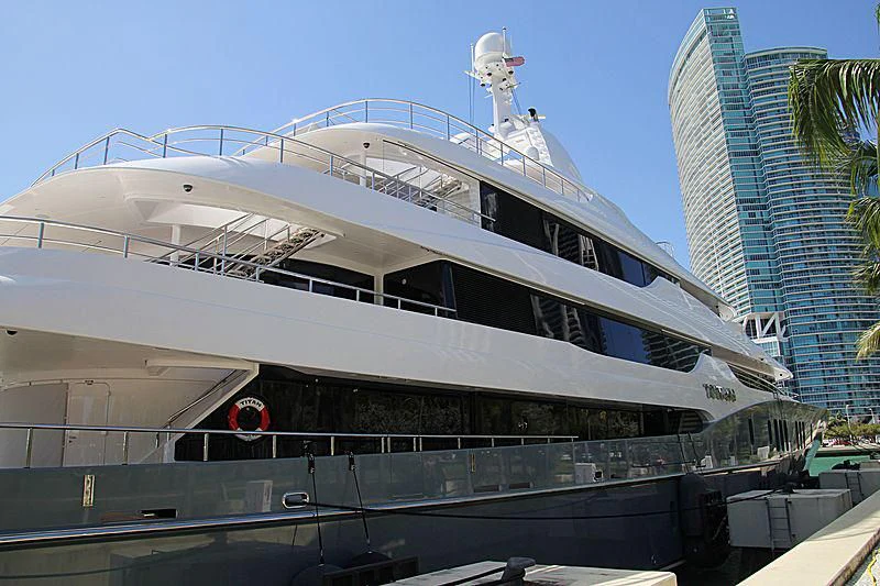 a large cruise ship docked aboard TITAN Yacht for Sale