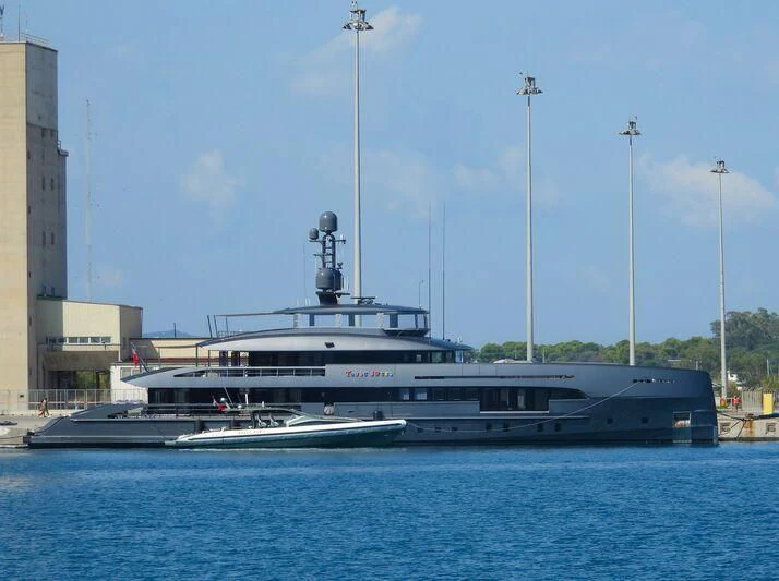 a large boat in the water aboard TOUTE SWEET Yacht for Sale