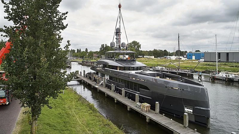 a large boat on the water aboard TOUTE SWEET Yacht for Sale