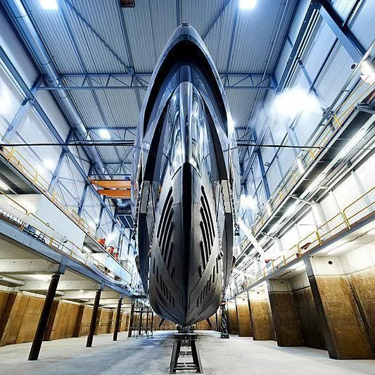 a large black and white rocket ship aboard TOUTE SWEET Yacht for Sale