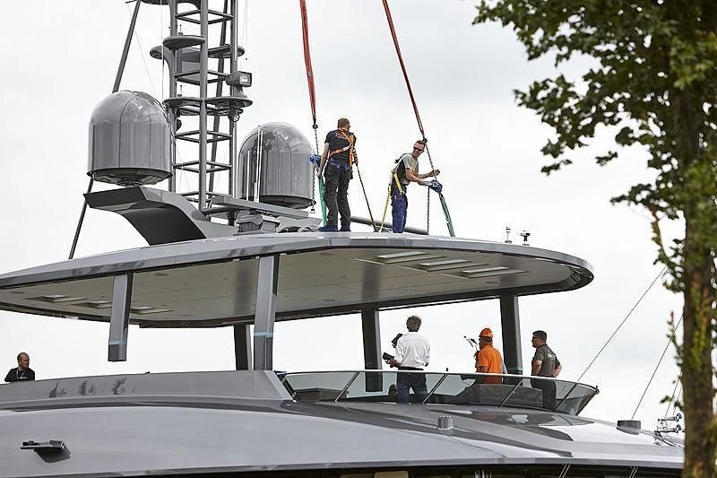 a group of people on a boat aboard TOUTE SWEET Yacht for Sale