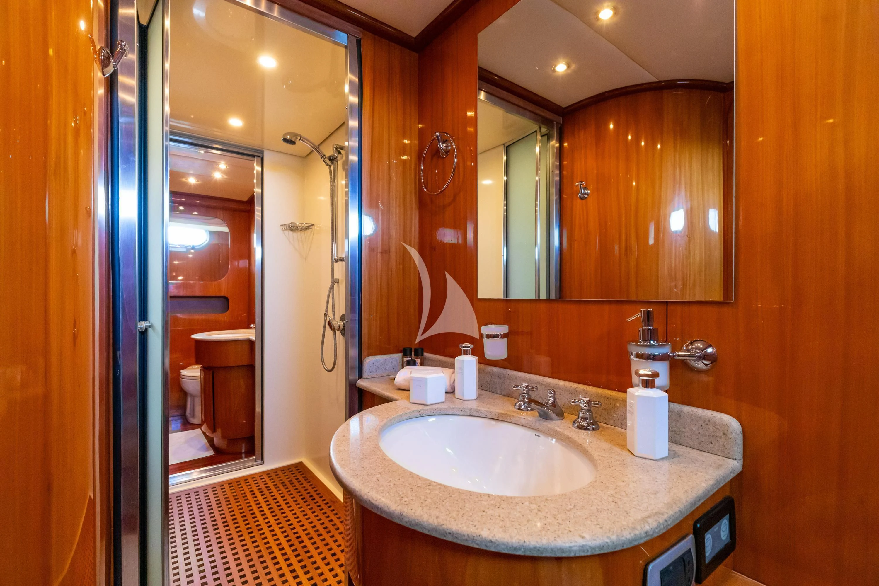 a bathroom with a sink and a mirror aboard SHANGRA Yacht for Sale