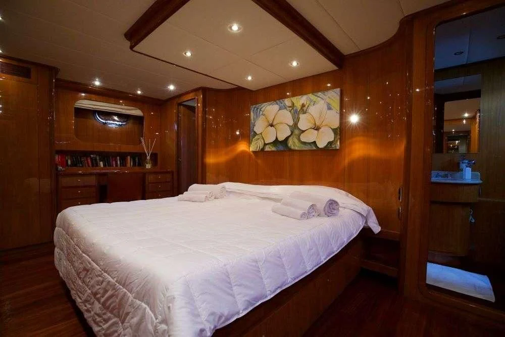 a bed in a room aboard SHANGRA Yacht for Sale