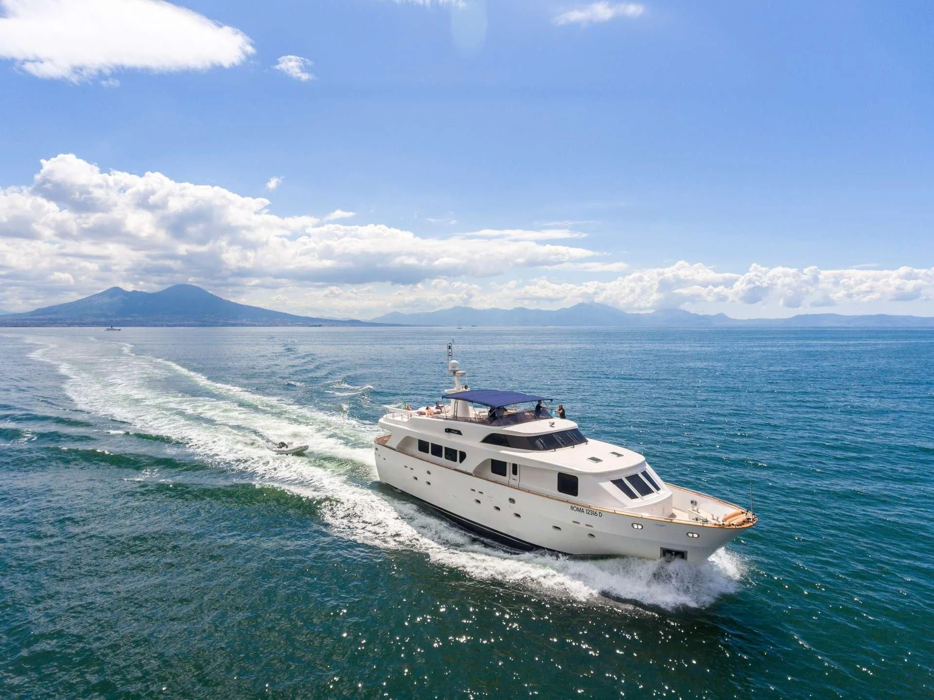 a white yacht on the water aboard SHANGRA Yacht for Sale