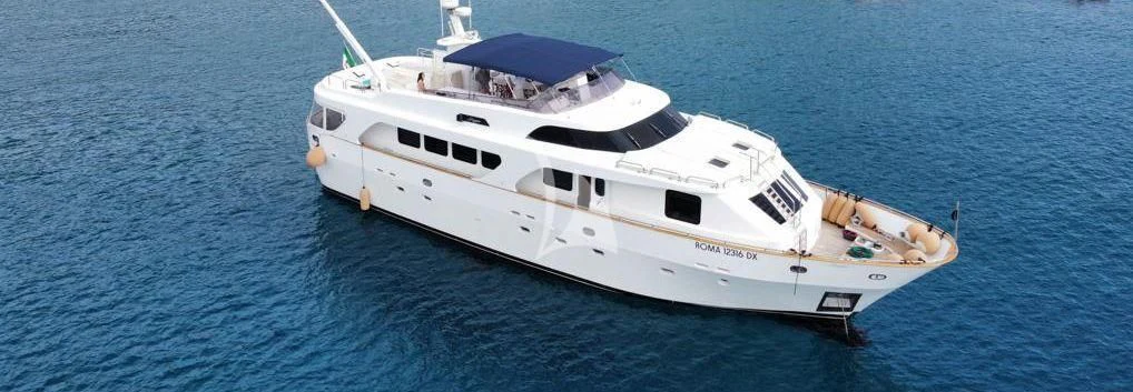 a white yacht in the water aboard SHANGRA Yacht for Sale