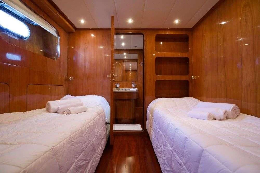 a couple of beds in a cabin aboard SHANGRA Yacht for Sale