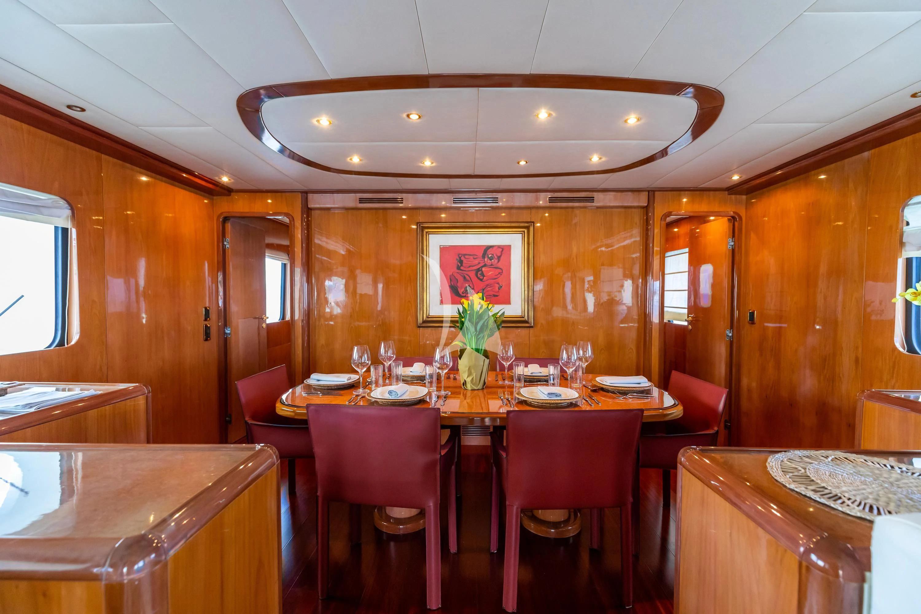 a dining room with a table and chairs aboard SHANGRA Yacht for Sale