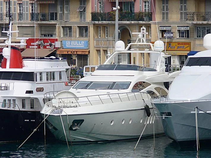 several boats in a harbor aboard PAPOS M Yacht for Sale