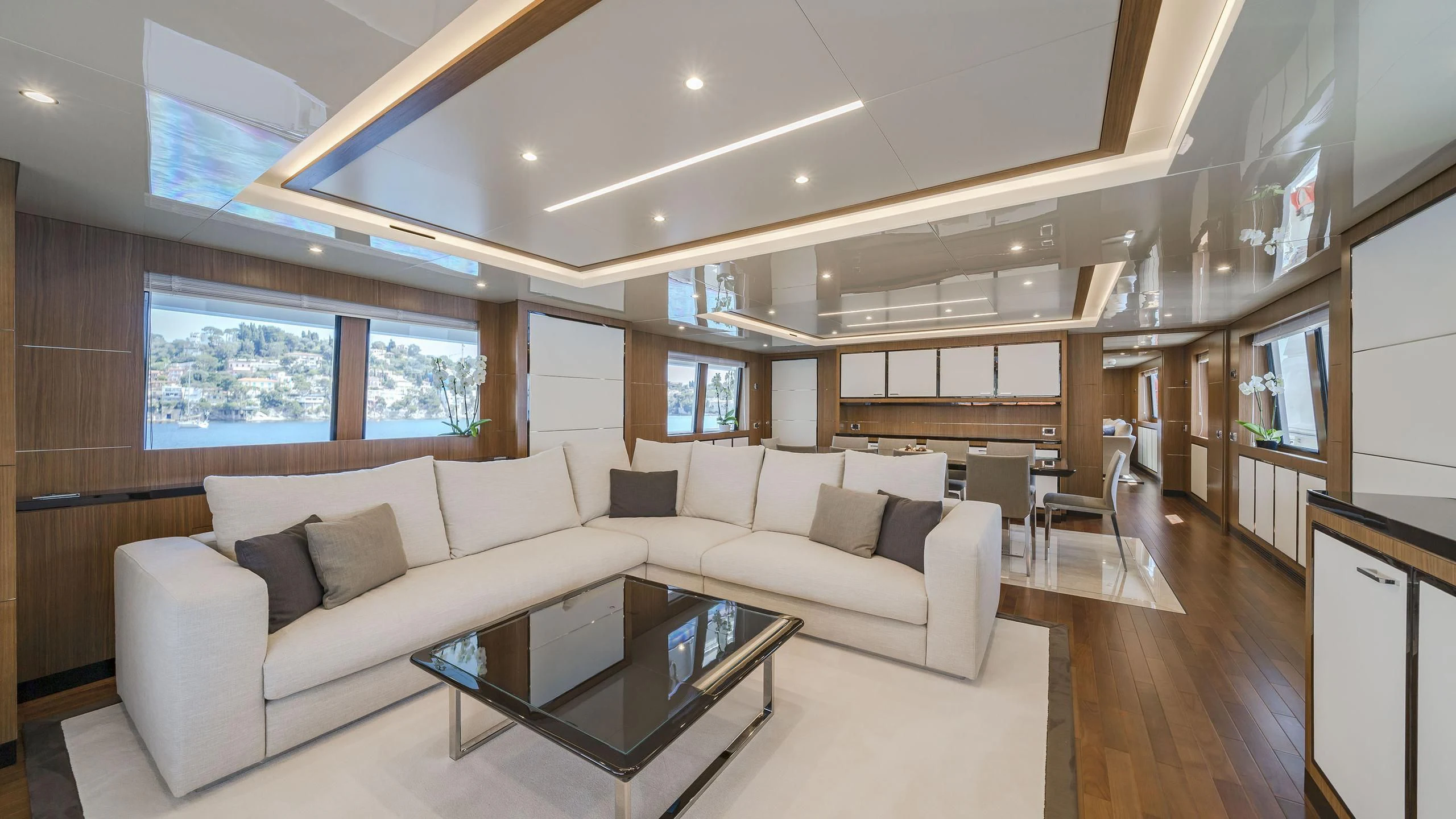 a living room with a couch and a table aboard FIORENTE Yacht for Sale