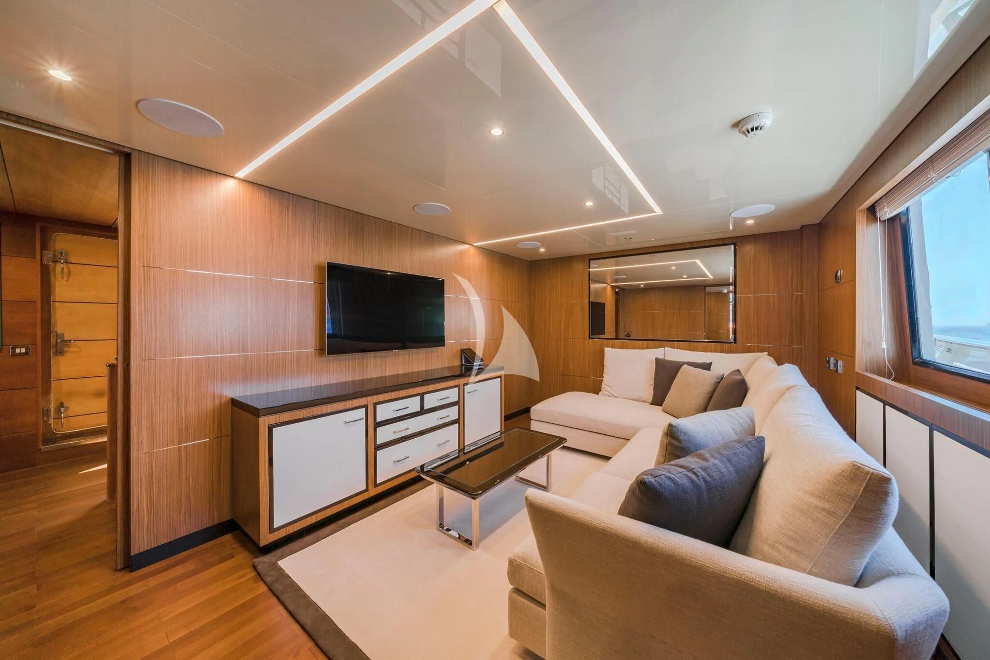 a living room with a large tv aboard FIORENTE Yacht for Sale