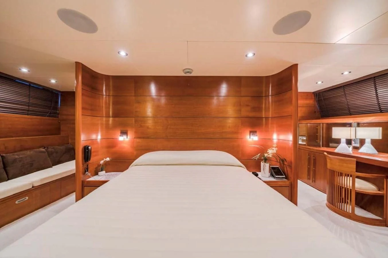 a room with a bed and a couch aboard FIORENTE Yacht for Sale