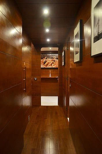 a hallway with wood doors aboard FIORENTE Yacht for Sale
