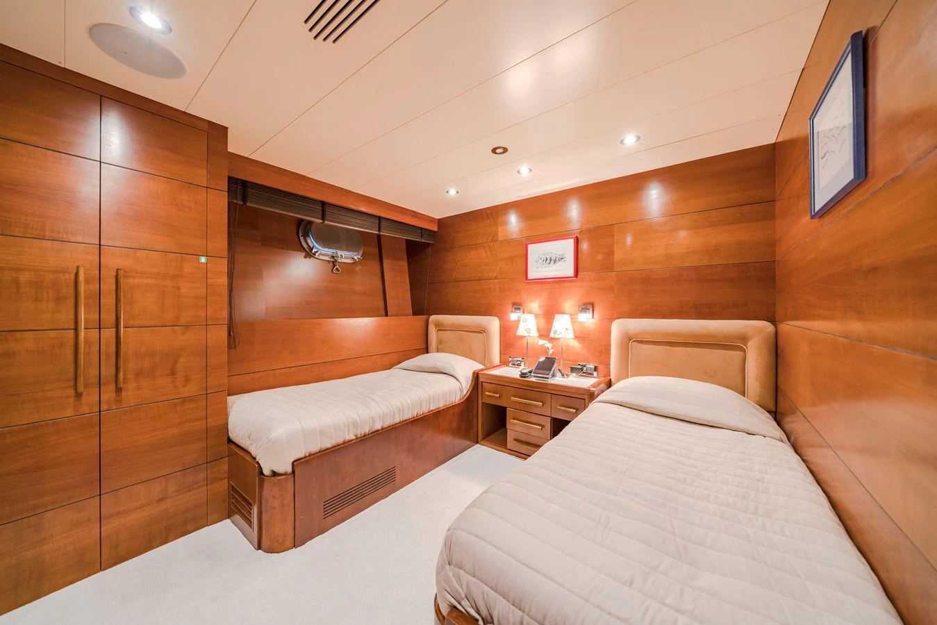 a room with a bed and a wood wall aboard FIORENTE Yacht for Sale