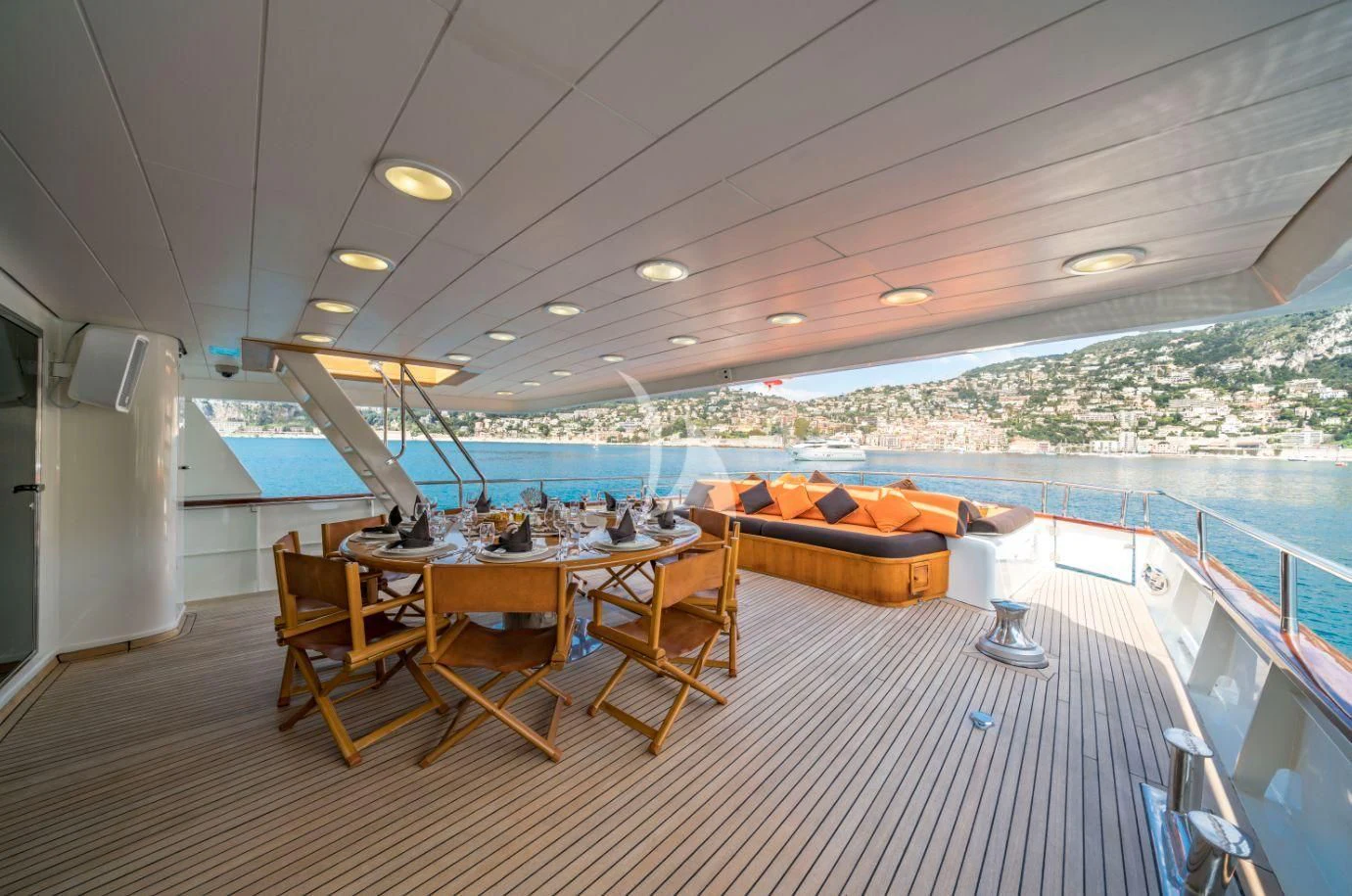 a room with a table and chairs aboard FIORENTE Yacht for Sale