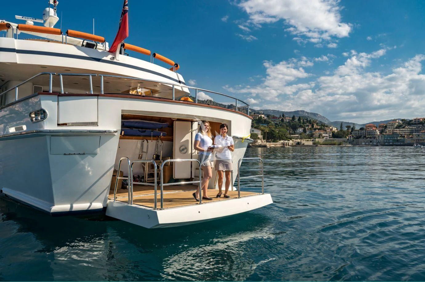 a couple of people on a boat aboard FIORENTE Yacht for Sale