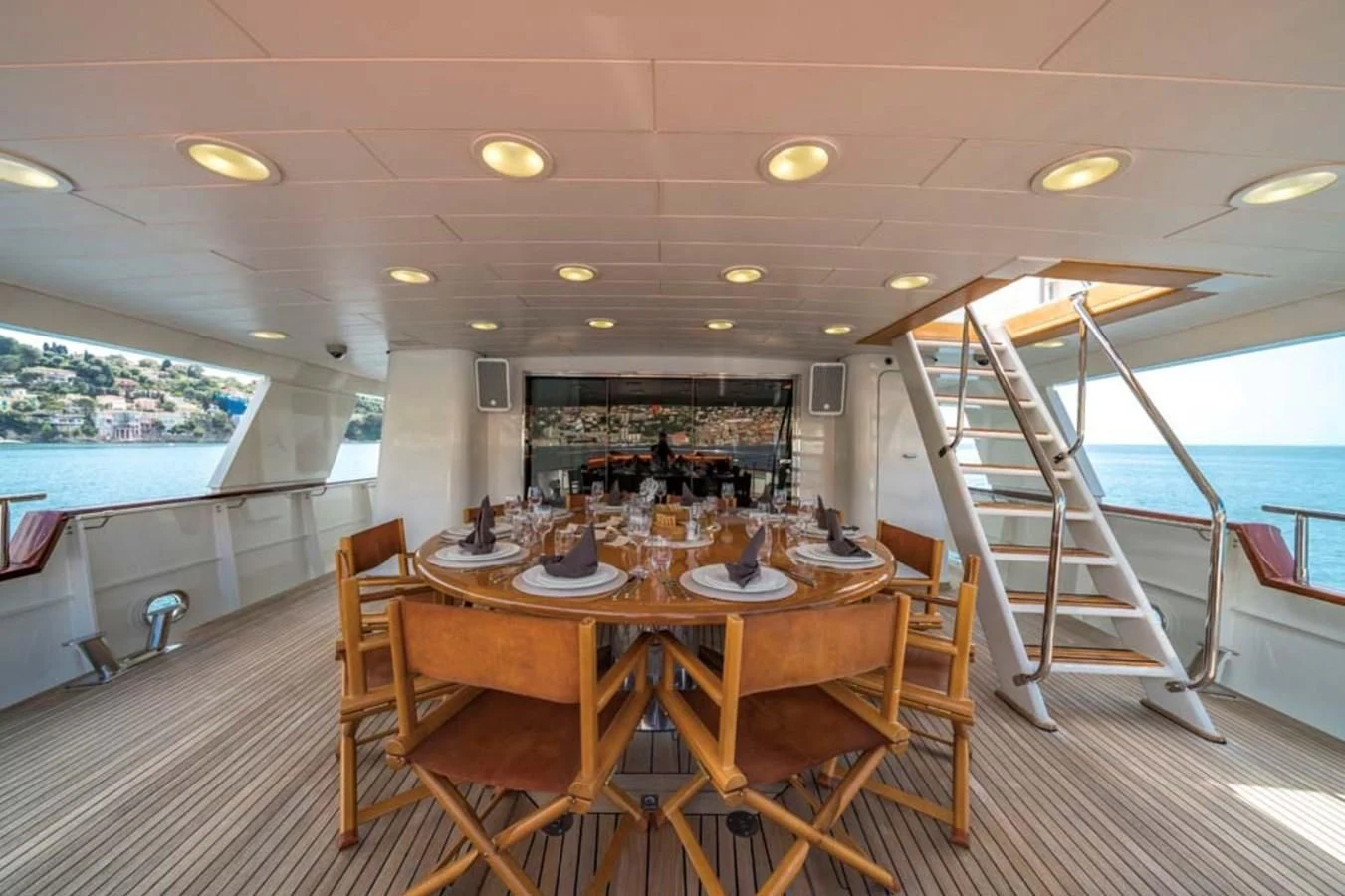 a dining room with a large table aboard FIORENTE Yacht for Sale