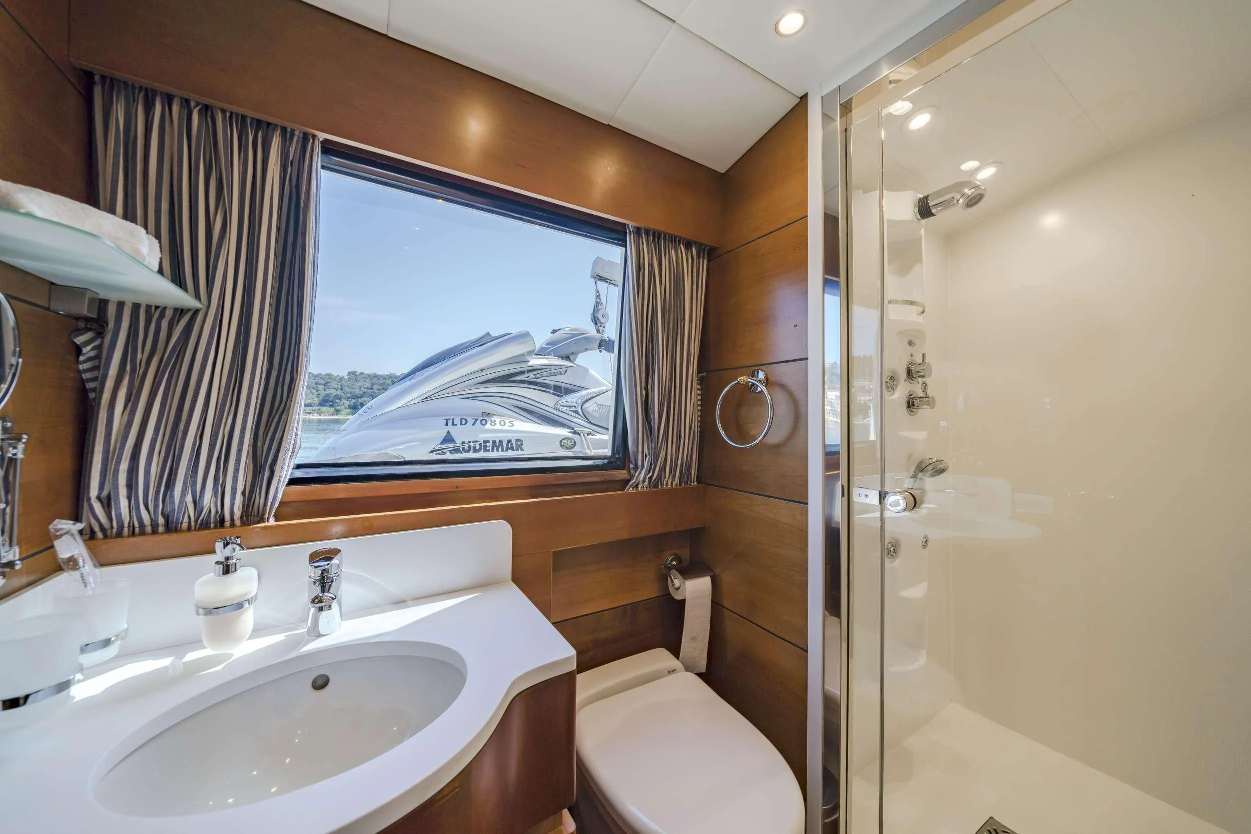 a bathroom with a large mirror aboard FIORENTE Yacht for Sale