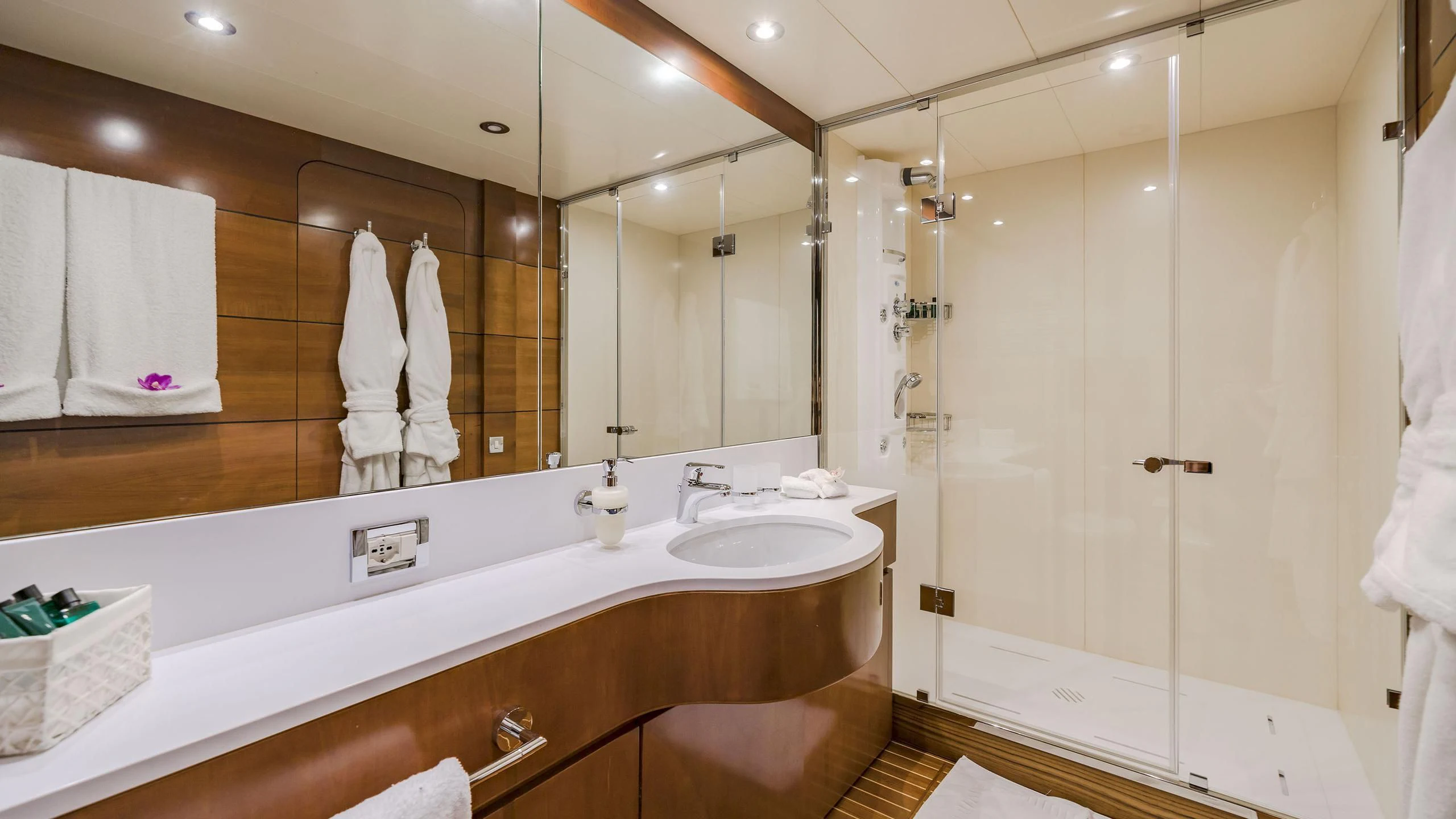 a bathroom with a large mirror aboard FIORENTE Yacht for Sale