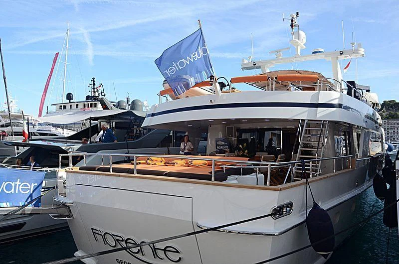 a boat with a flag on the front aboard FIORENTE Yacht for Sale