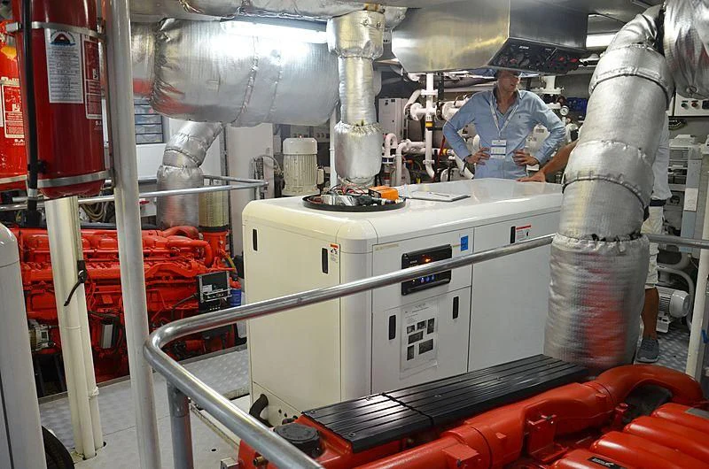 a few people in a factory aboard FIORENTE Yacht for Sale