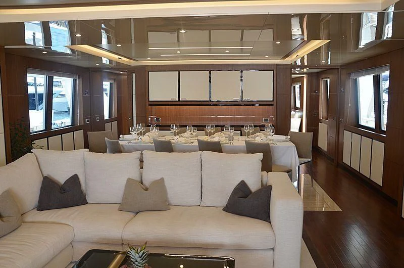 a living room with a large window aboard FIORENTE Yacht for Sale