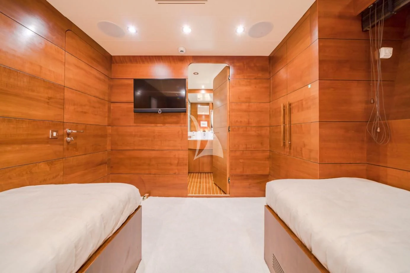 a room with a bed and a tv aboard FIORENTE Yacht for Sale
