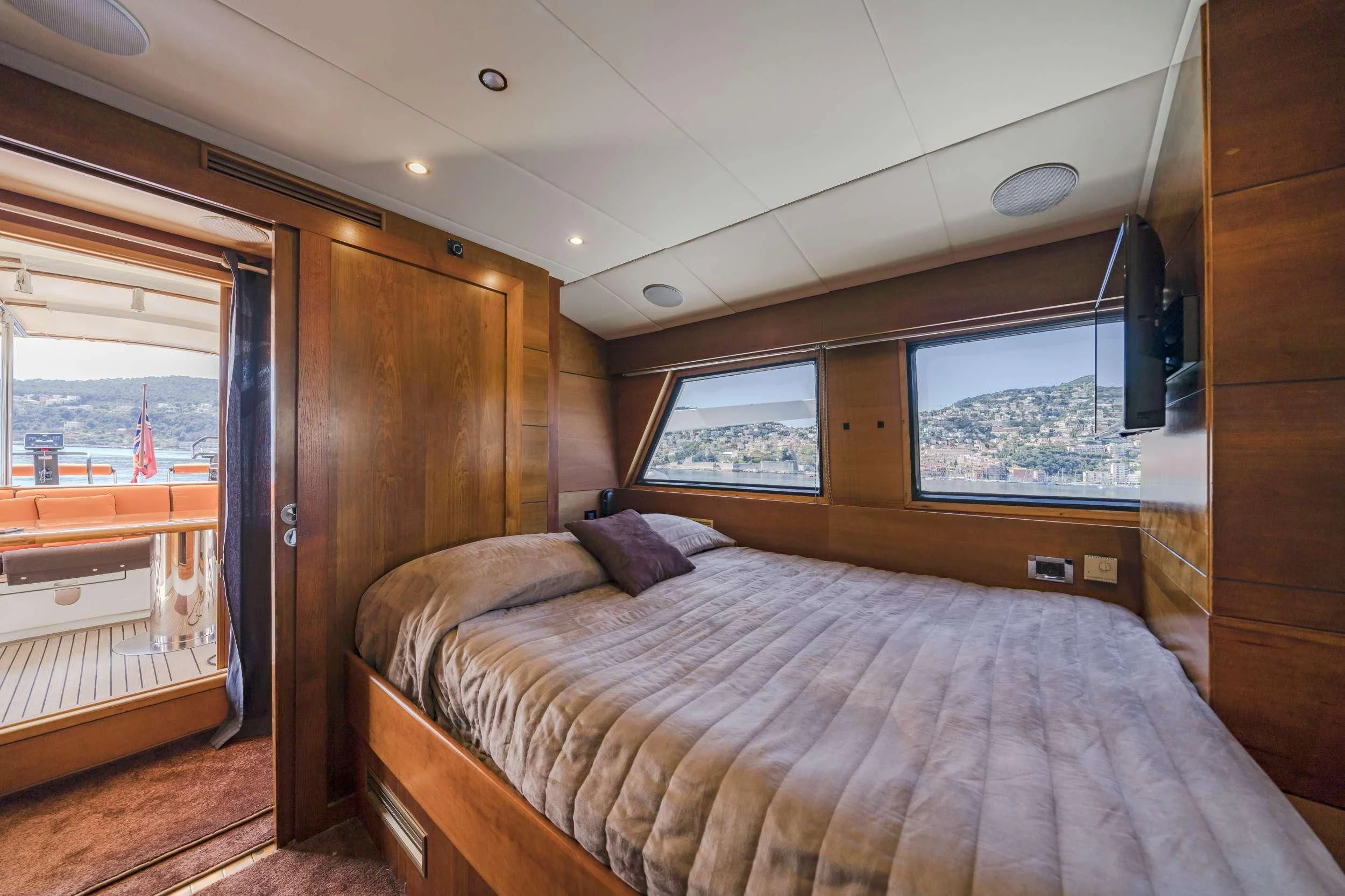 a bedroom with a large bed aboard FIORENTE Yacht for Sale