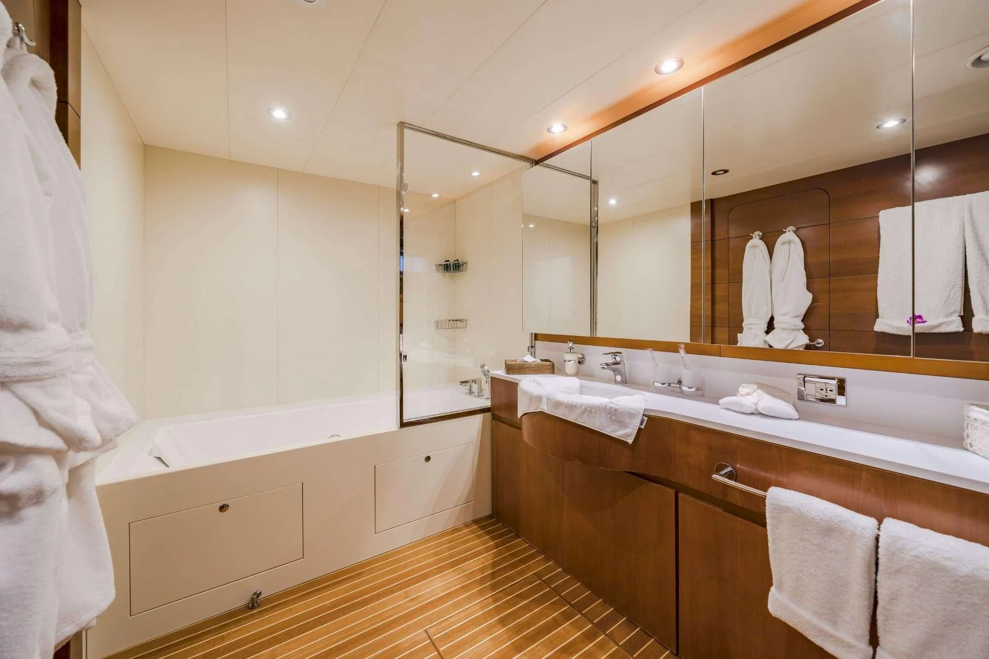 a bathroom with a large mirror aboard FIORENTE Yacht for Sale