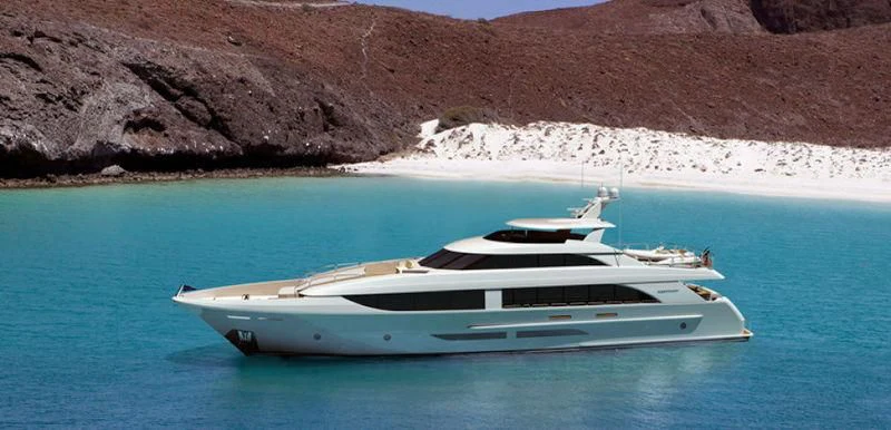 a white boat in the water aboard FREEDOM Yacht for Sale