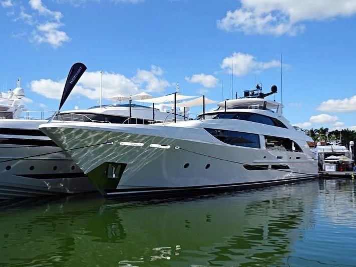 a white yacht in the water aboard FREEDOM Yacht for Sale